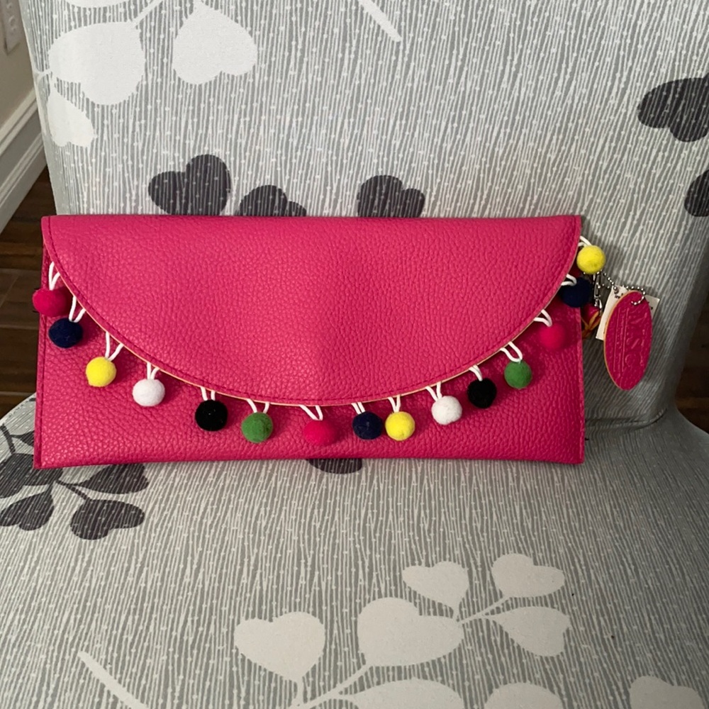 MSC Mainstreet collection pink clutch or wristlet